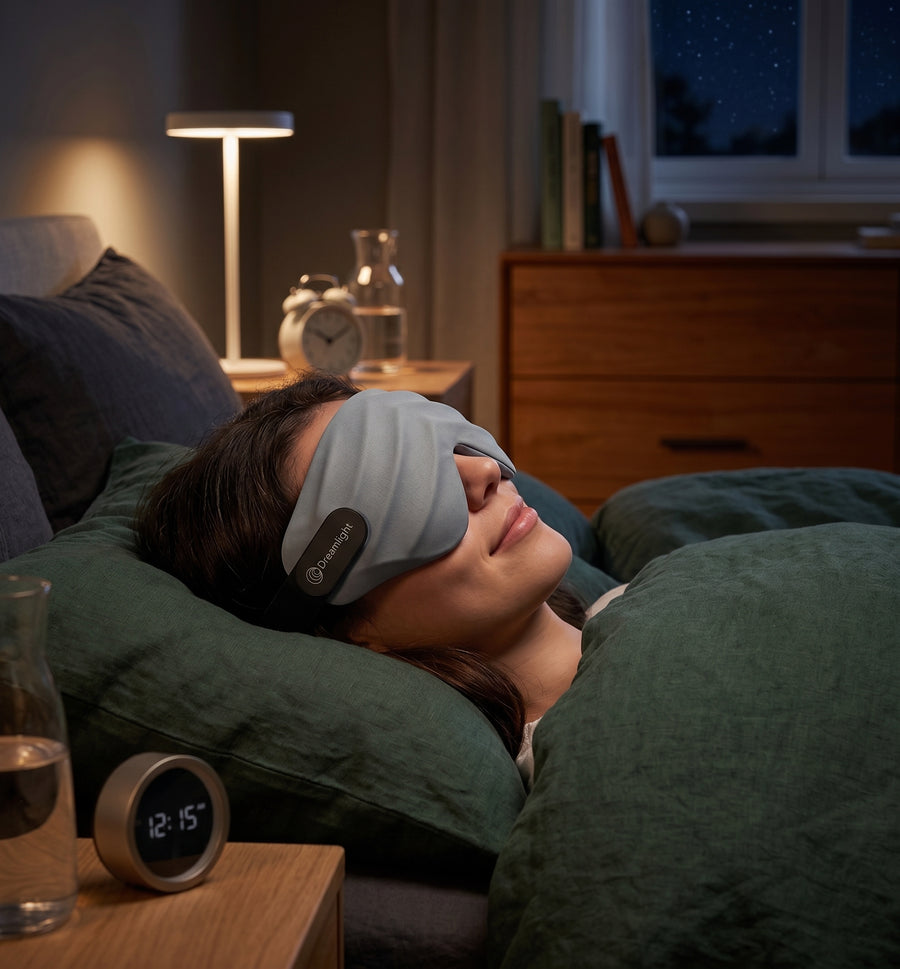 Dreamlight 4S sleep mask worn while sleeping in bed at night